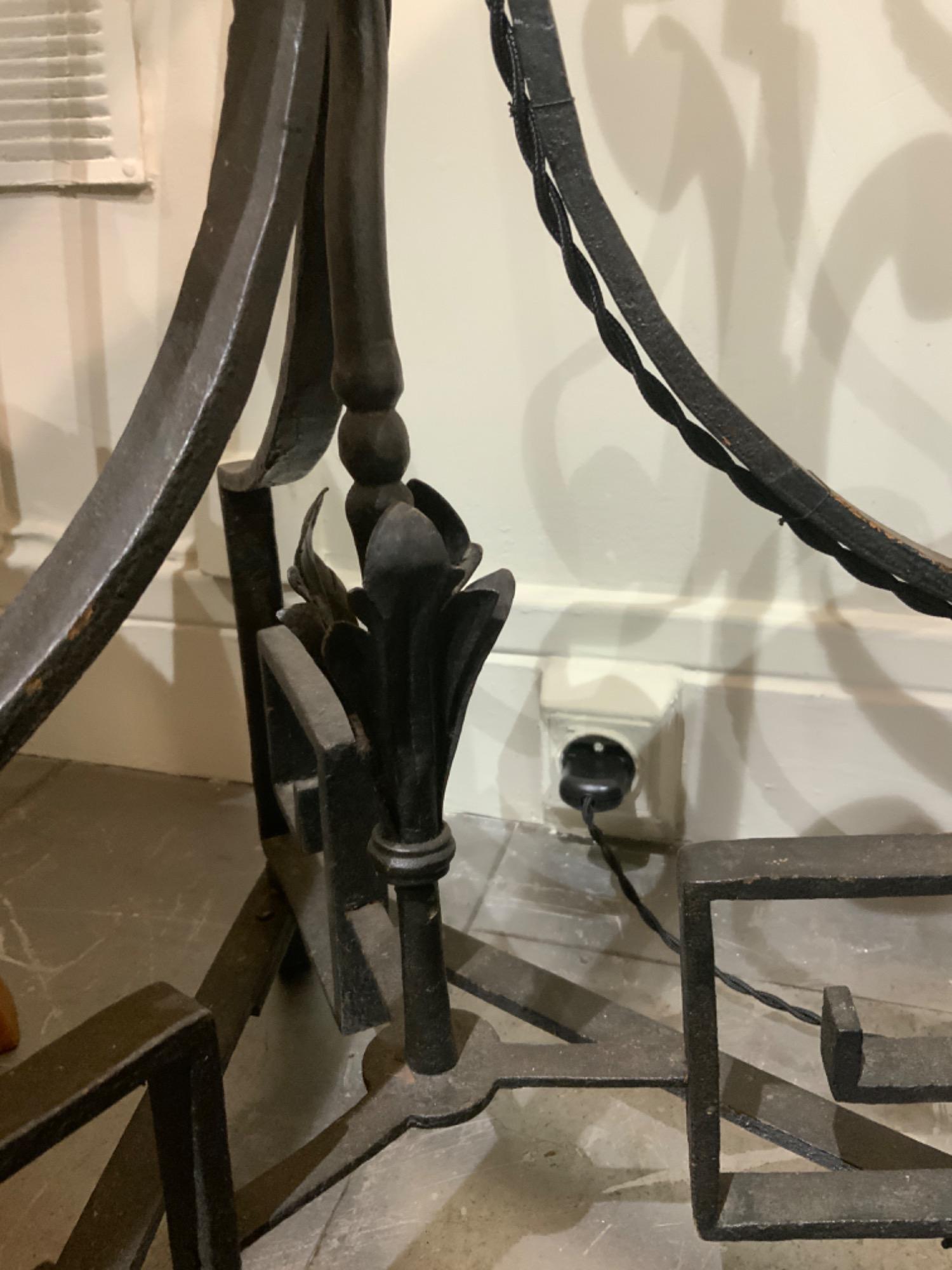 Pair of iron floor lamps France circa 1940