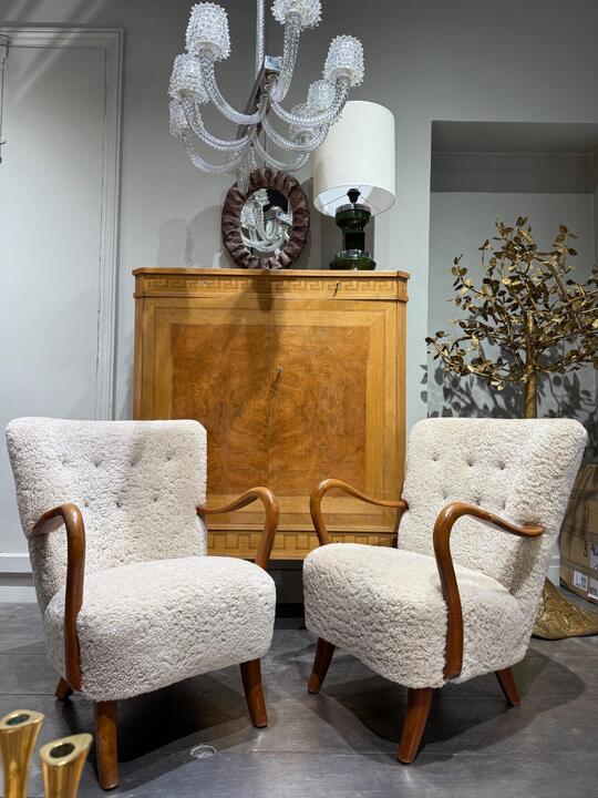 A christensen pair of armchairs in sheepskin corca 1940 