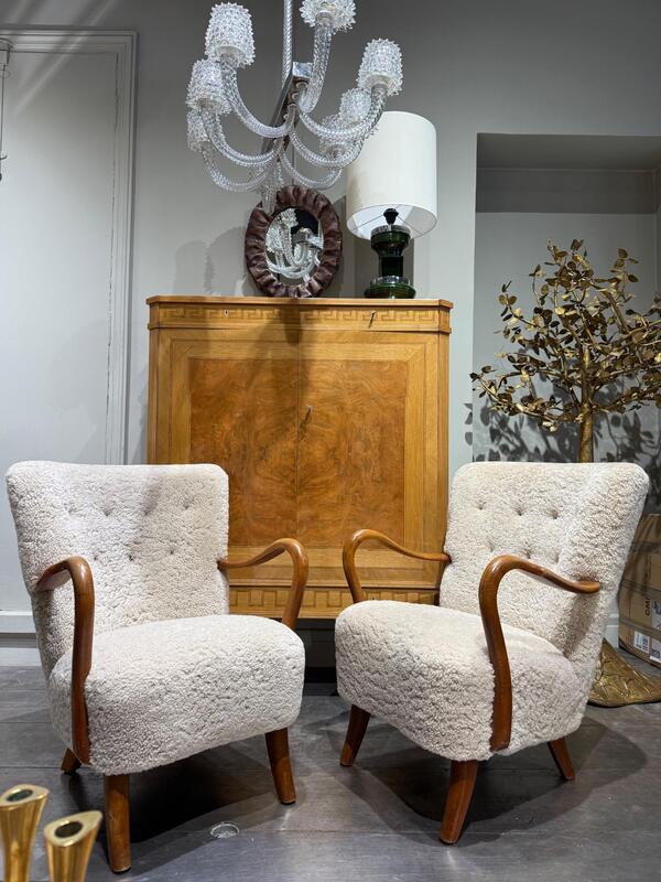 A christensen pair of armchairs in sheepskin corca 1940 