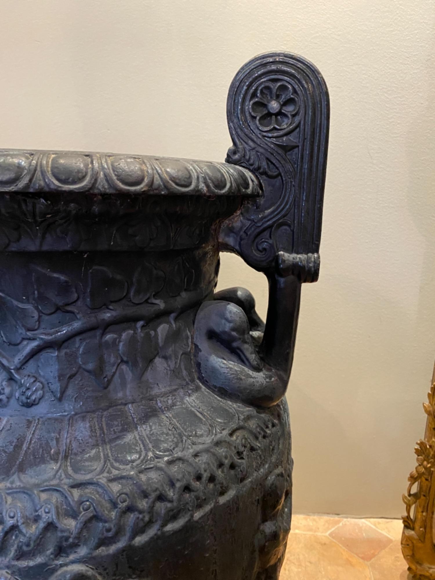 Pair of French cast iron urns 19th c 