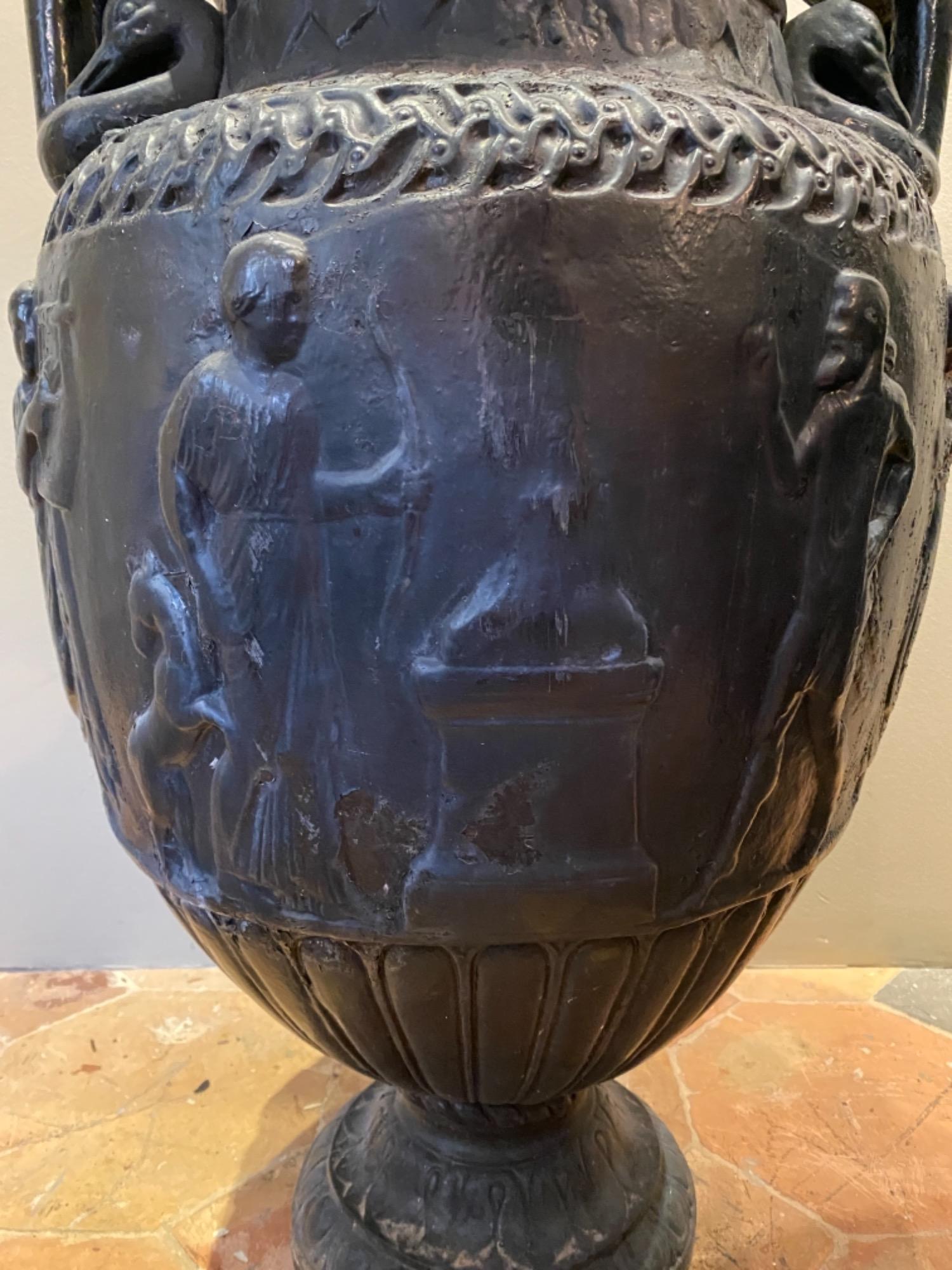 Pair of French cast iron urns 19th c 