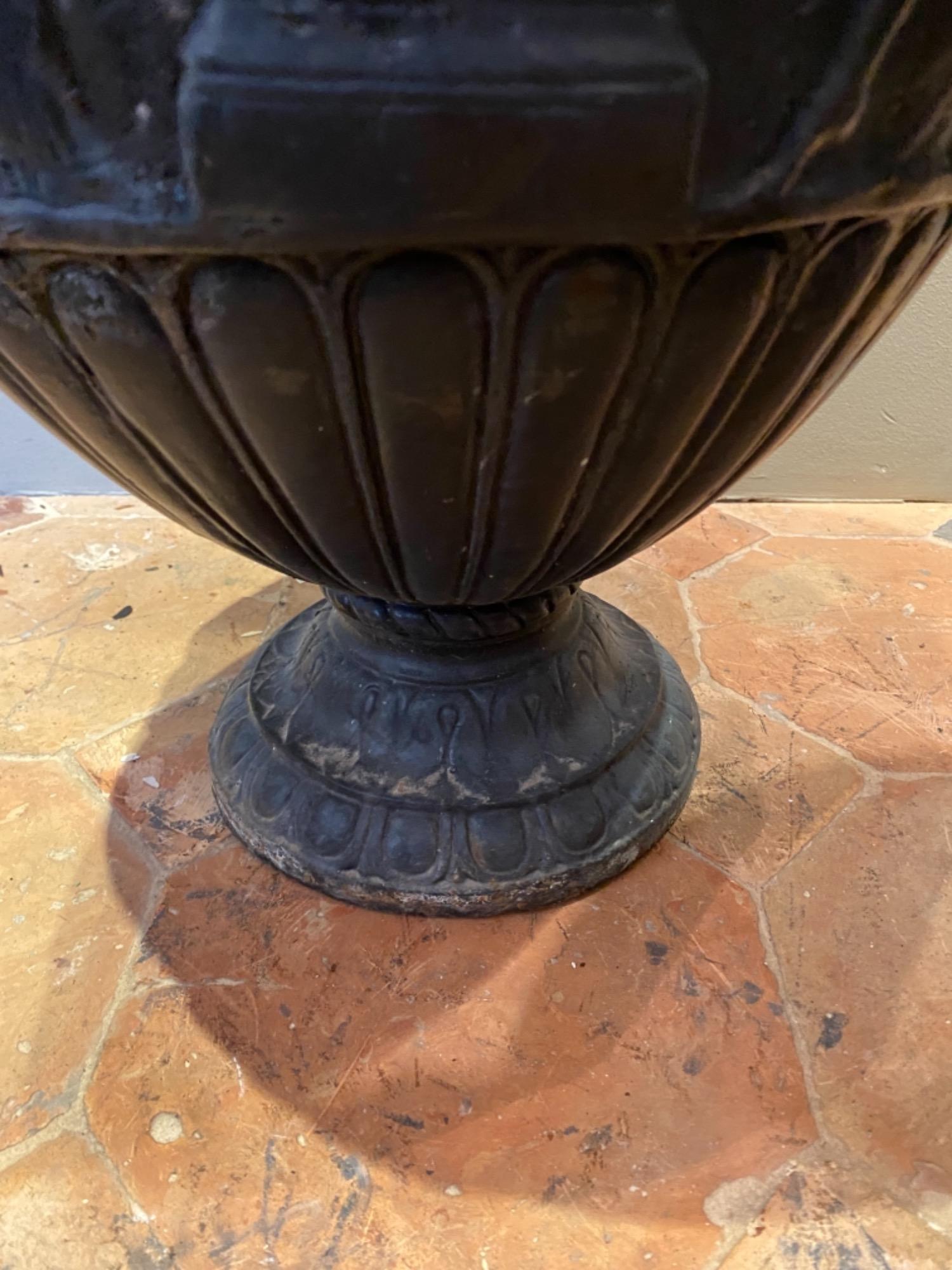 Pair of French cast iron urns 19th c 