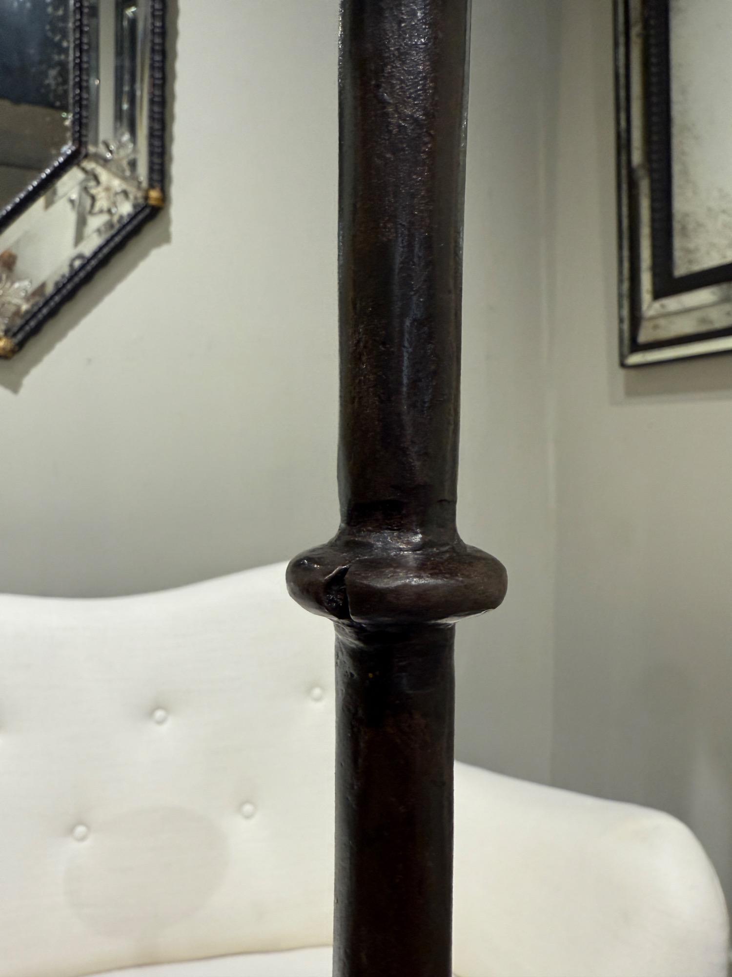 Tall pair of wrought iron candelholders 17th c 
