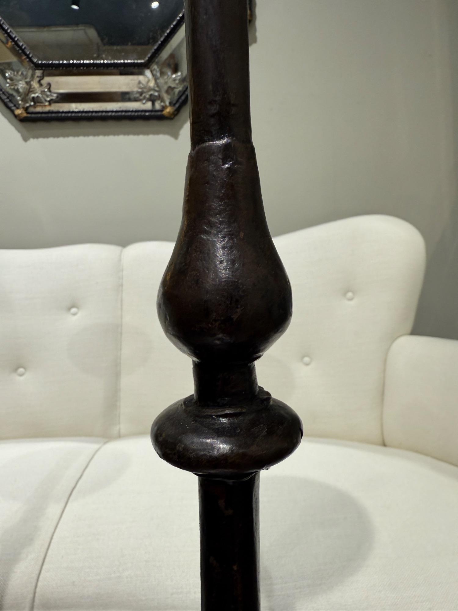 Tall pair of wrought iron candelholders 17th c 